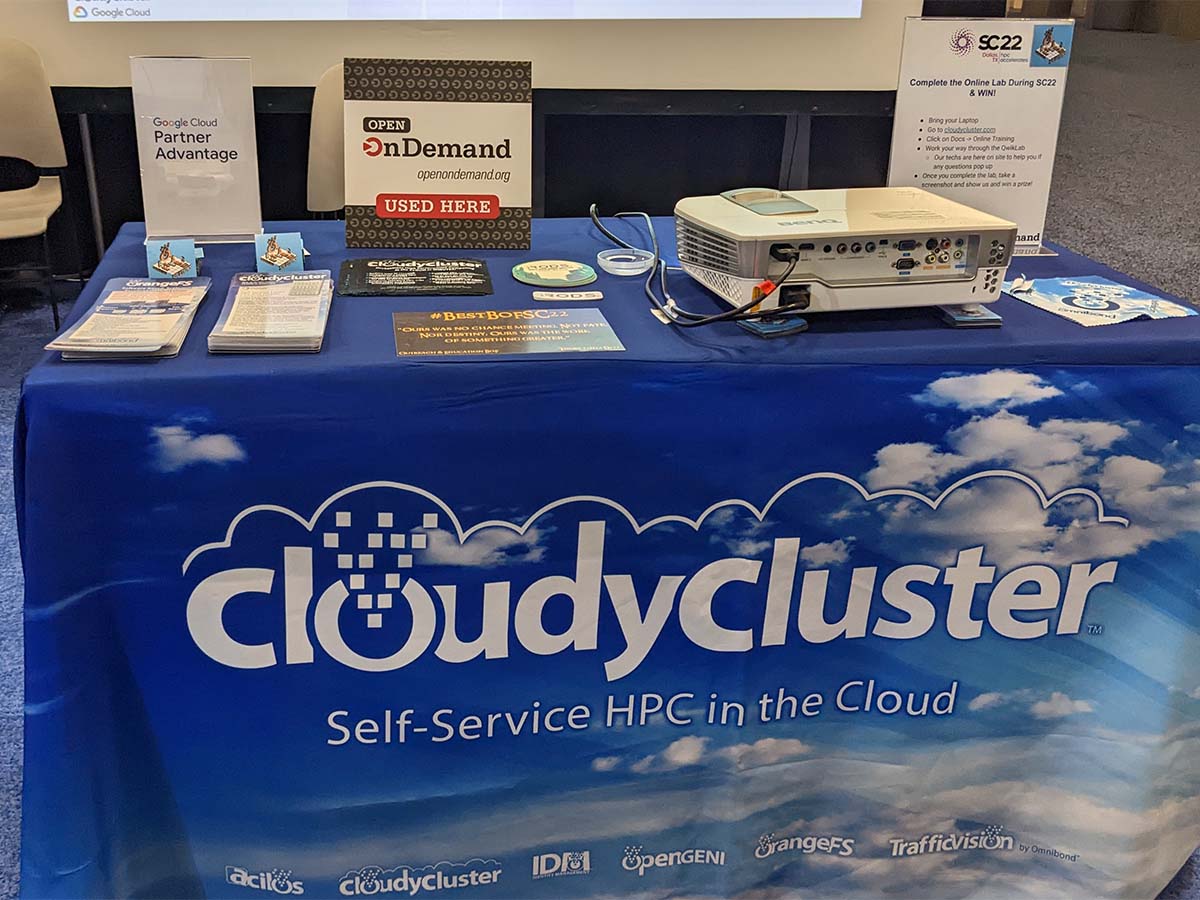 CloudyCluster booth at SC22 with Open OnDemand placard