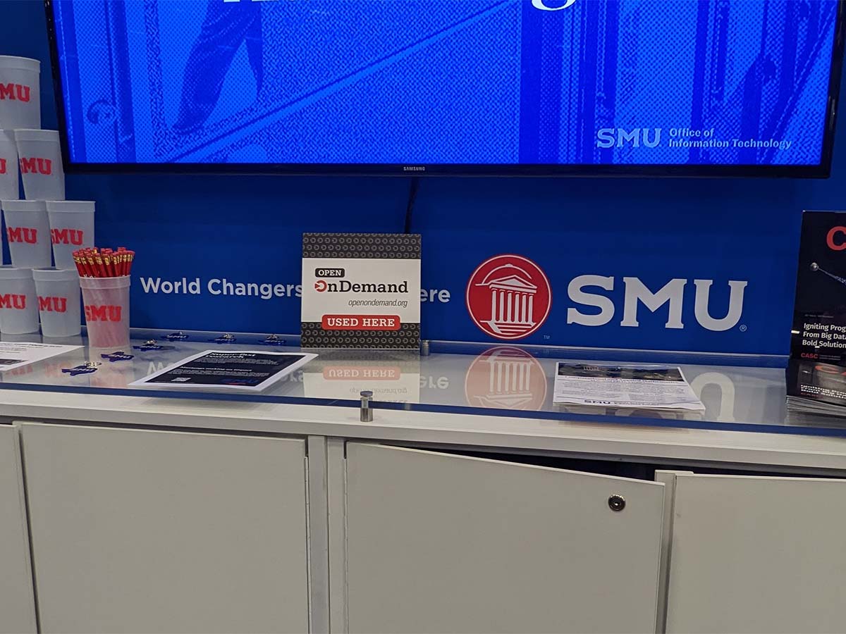 Southern Methodist University booth at SC22 with Open OnDemand placard