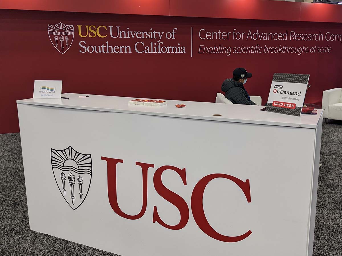 USC booth at SC22 with Open OnDemand placard
